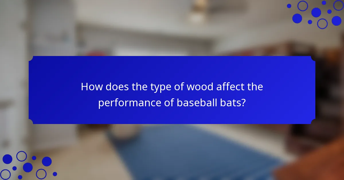How does the type of wood affect the performance of baseball bats?